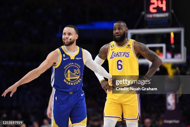 LeBron James of the Los Angeles Lakers & Stephen Curry of the Golden State Warriors looks on during the game during round two game four of the 2023...