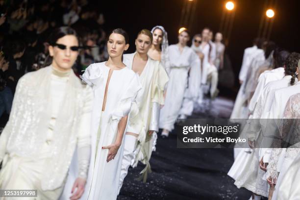 Models walk the runway during the finale of the Datuna Fall-Winter 2023-2024 show as part of Mercedes-Benz Fashion Week Tbilisi on May 8, 2023 in...