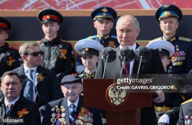 Russian President Vladimir Putin gives a speech during the Victory Day military parade at Red Square in central Moscow on May 9, 2023. Russia...