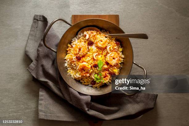 indian food biryani with basmati rice and shrimp - basmati rice stock pictures, royalty-free photos & images