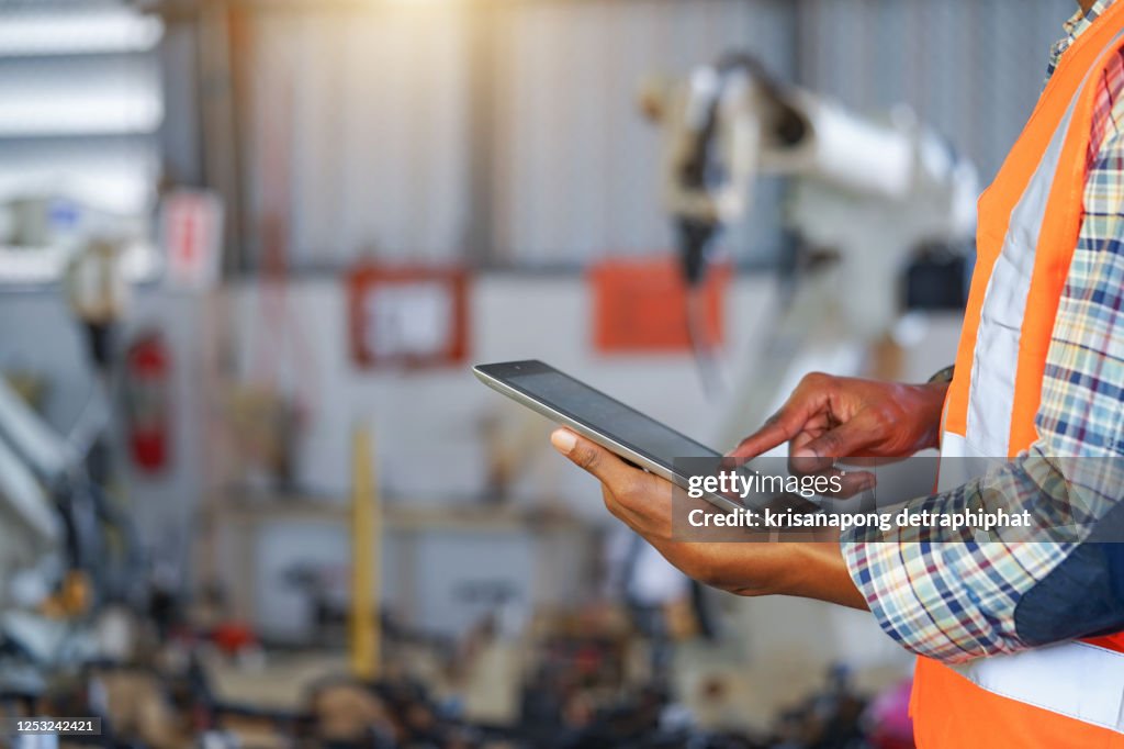Robotics Control System Engineer Robotics Control Engineer In Car Part Factoryengineer Concept High-Res ...