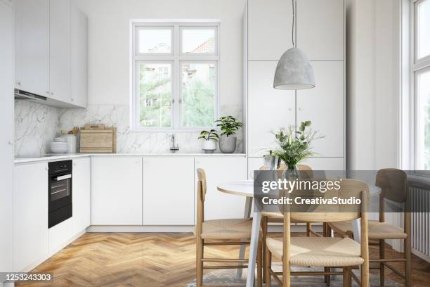 modern scandinavian kitchen and dining room interior stock photo - scandinavia stock pictures, royalty-free photos & images