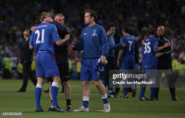 Kirk Broadfoot of Rangers is consoled by Ally McCoist at full time during the UEFA Cup Final between Zenit St. Petersburg and Glasgow Rangers at the...