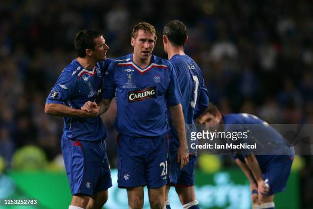 Kirk Broadfoot of Rangers is consoled by Lee McCulloch at full time during the UEFA Cup Final between Zenit St. Petersburg and Glasgow Rangers at the...