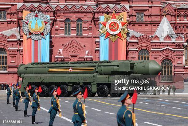 Russian Yars intercontinental ballistic missile launcher rolls through Red Square during the Victory Day military parade in central Moscow on May 9,...