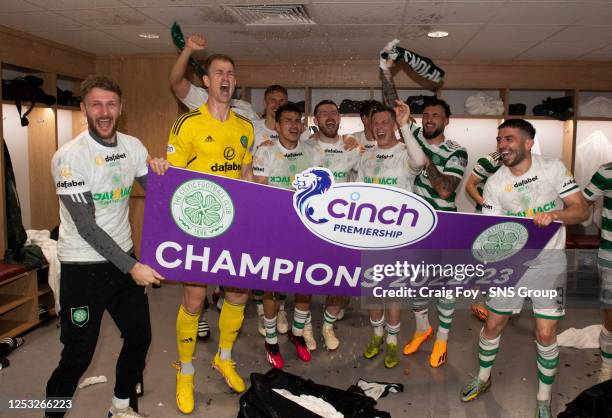 Celtic players celebrate after a cinch Premiership match between Heart of Midlothian and Celtic at Tynecastle Park, on May 07 in Edinburgh, Scotland.