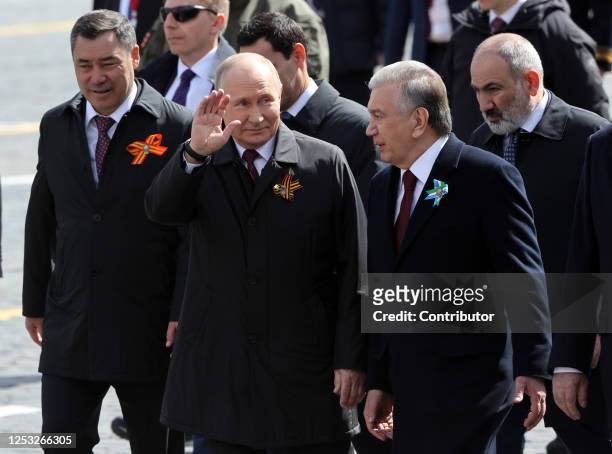 Kyrgyz President Sadyr Japarov , Russian President Vladimir Putin , Uzbek President Shavkat Mirziyoyev , Armenian President Nikol Pashinyan walk...