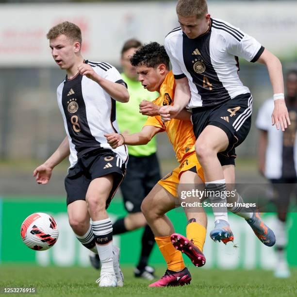 Max Knoll of Germany U15, Ayoub Ouarghi of Holland U15, Julian Schuster of Germany U15 during the U15 Men match between Holland U15 v Germany U15 at...