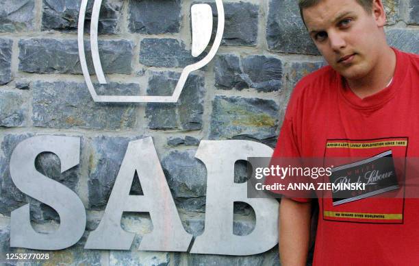 Justin Nurse, the 25 year old sole member of the Laugh It Off company, poses in one of his satirical t-shirts which parody well-known mega brands...