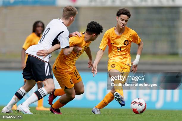 Max Knoll of Germany U15, Ayoub Ouarghi of Holland U15, Jimmi Laarman of Holland U15 during the U15 Men match between Holland U15 v Germany U15 at...