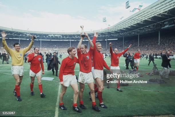 World Cup Final, Wembley. England v West Germany . England on their lap of honour with the Jules Rimet Trophy Banks, Wilson, Ball, Charlton, Moore...