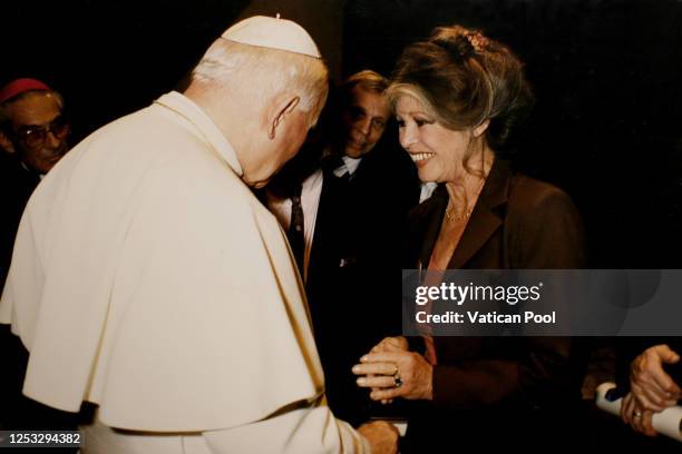 Pope John Paul II meets French actress Brigitte Bardot at his private library in the Apostolic Palace on September 27, 1995 in Vatican City, Vatican