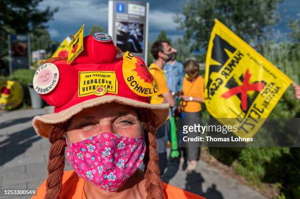 Anti-nuclear activists converging from both Germany and France gather together on the Rhine bridge Breisach-Vogelgrun on the German/French border for...