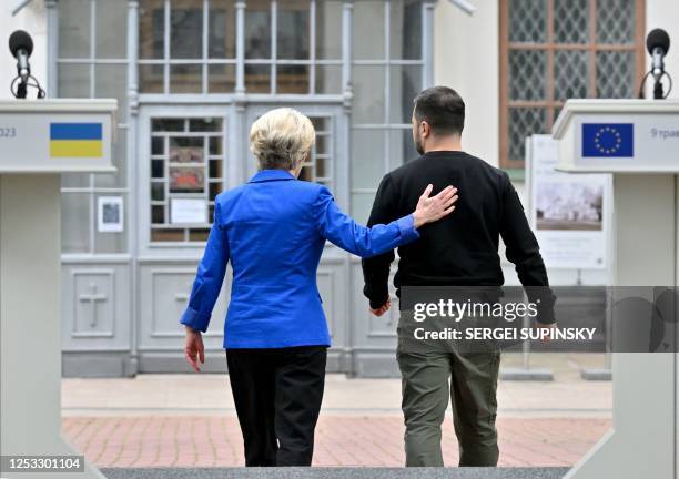 Ukrainian President Volodymyr Zelensky and President of the European Commission Ursula von der Leyen leave after their press-conference following in...