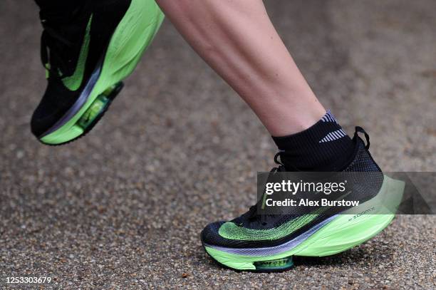 Detailed view of the Nike trainers of British marathon runner Charlotte Purdue as she runs during a training session on June 29, 2020 in East...