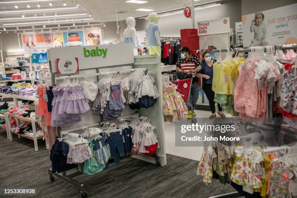 Zully and Marvin shop at Target on May 20, 2020 in Stamford, Connecticut. The Guatemalan immigrants fell sick to Covid-19 in March and are now...