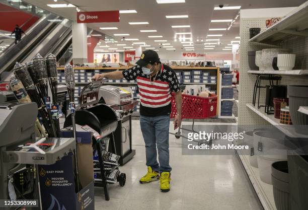 Marvin shops for a BBQ grill at Target on May 20, 2020 in Stamford, Connecticut. His family is adjusting to life after recovering from the Covid-19....