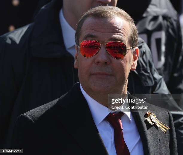 Russian Security Council Deputy Chairman Dmitry Medvedev wearing sunglasses arrives to the Victory Day Red Square Parade on May 9, 2023 in Moscow,...