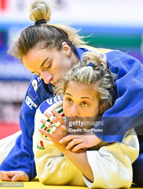 Odette Giuffrida of Italy in action against Distria Krasniqi of Kosovo during the women's -52kg bronze medal bout of the World Judo Championships...