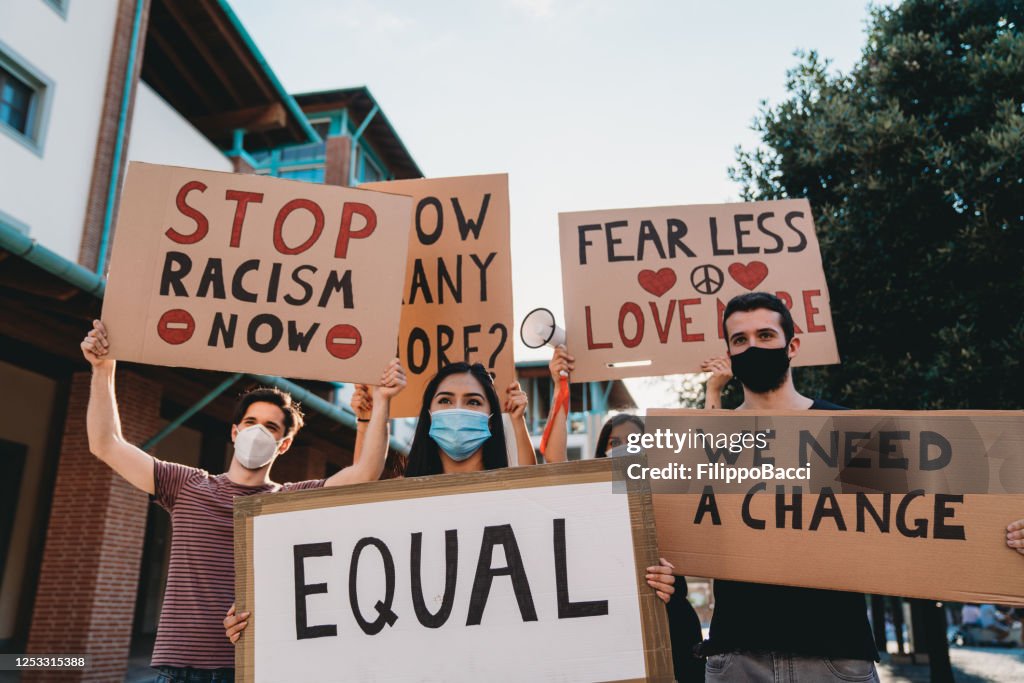 End Racism Protest Group Of People Participating In An Antiracism Protest High-Res Stock ...