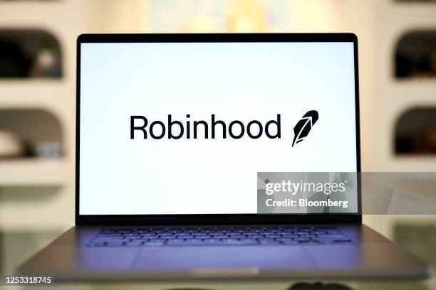 The Robinhood logo on a laptop cpmputer arranged in the Brooklyn borough of New York, US, on Monday, May 8, 2023. Robinhood Markets Inc. Is scheduled...