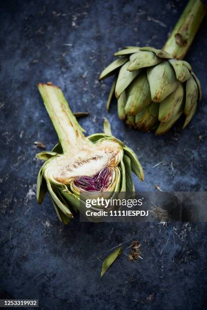 cut open artichoke - artichoke stock pictures, royalty-free photos & images