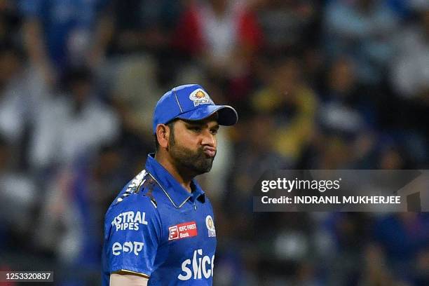 Mumbai Indians' Rohit Sharma gestures during the Indian Premier League Twenty20 cricket match between Mumbai Indians and Royal Challengers Bangalore...