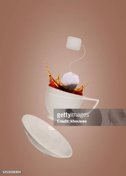tea cup - tea bags stock pictures, royalty-free photos & images