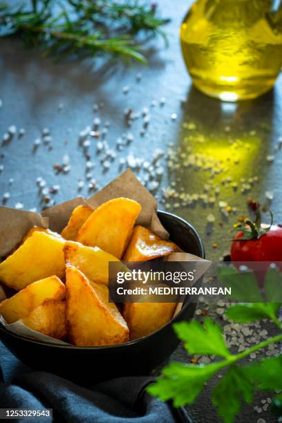 french fries potatoes with spices as salt and pepper - patatas chips stock pictures, royalty-free photos & images