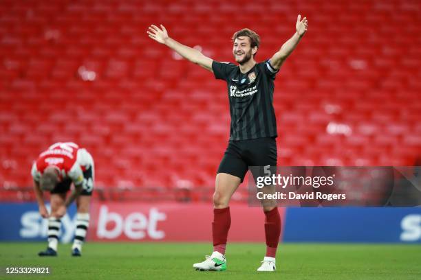 Charlie Goode of Northampton Town celebrates after winning the Sky Bet League Two Play Off Final between Exeter City v Northampton Town at Wembley...