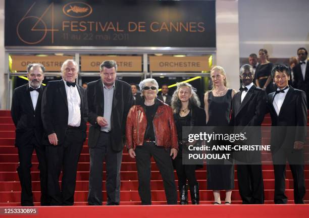 French actor Jean-Pierre Darroussin, French actor Andre Wilms, Finnish director Aki Kaurismaki, French singer Little Bob, a guest, Finnish actress...