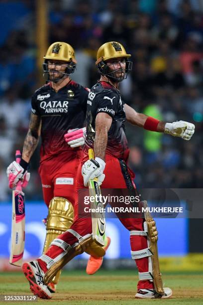 Royal Challengers Bangalore's Glenn Maxwell and Faf du Plessis run between the wickets during the Indian Premier League Twenty20 cricket match...