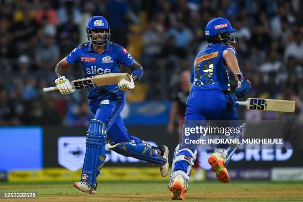 Mumbai Indians' Suryakumar Yadav and Nehal Wadhera run between the wickets during the Indian Premier League Twenty20 cricket match between Mumbai...