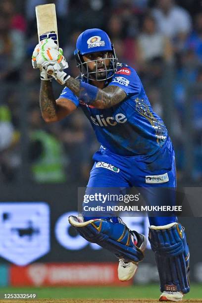 Mumbai Indians' Suryakumar Yadav plays a shot during the Indian Premier League Twenty20 cricket match between Mumbai Indians and Royal Challengers...