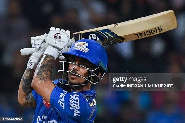 Mumbai Indians' Ishan Kishan plays a shot during the Indian Premier League Twenty20 cricket match between Mumbai Indians and Royal Challengers...