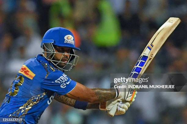 Mumbai Indians' Suryakumar Yadav plays a shot during the Indian Premier League Twenty20 cricket match between Mumbai Indians and Royal Challengers...