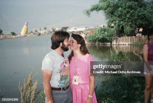 American computing entrepreneur Steve Wozniak with his wife, slalom canoeist Candice Clark at the US Festival in the Glen Helen Regional Park,...