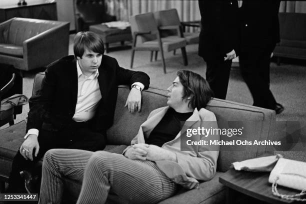 Singer Carl Wilson of the Beach Boys and drummer Joe Butler of The Lovin' Spoonful, 1966. The Lovin' Spoonful are a support act for the Beach Boys...