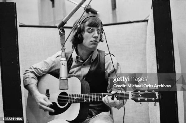 Singer and guitarist John Sebastian of American rock band The Lovin' Spoonful during a recording session for the song 'Summer in the City' in New...