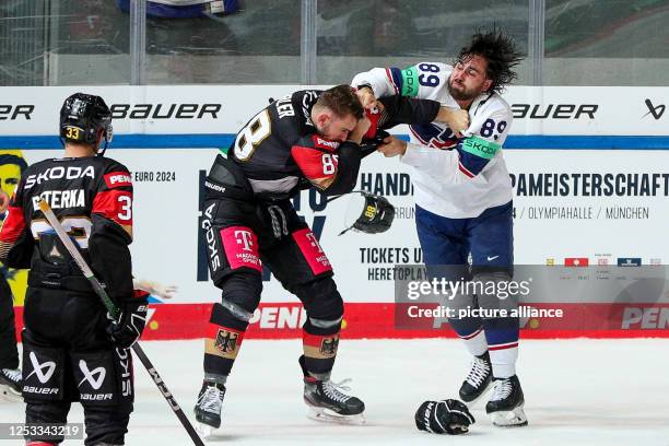 May 2023, Bavaria, Munich: Ice hockey: International match, World Cup preparation, Germany - USA at the Olympia Ice Stadium. Germany's Tobias Fohrler...