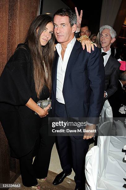 Elizabeth Saltzman, Tim Jefferies and Richard Buckley attend a private dinner hosted by Wolfgang Puck, his wife Gelila Puck and Charles Finch to...