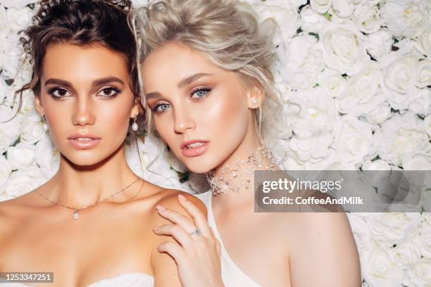 photo of two beautiful girls - platinum rings stock pictures, royalty-free photos & images