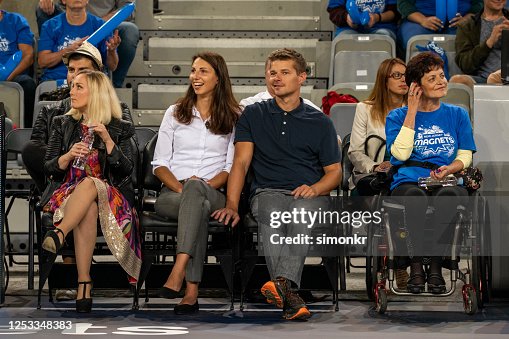 Celebrities watching basketball match Celebrities watching basketball match