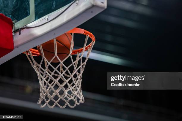 basketball in hoop - basket stock pictures, royalty-free photos & images