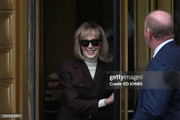 Magazine columnist E. Jean Carroll departs the Manhattan Federal Court in New York City on May 9, 2023. A New York jury ruled Tuesday that Donald...
