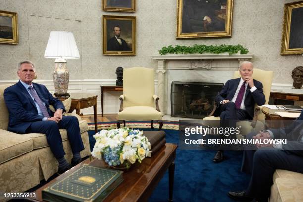Speaker of the House Kevin McCarthy and US President Joe Biden wait for a meeting about the United States's debt ceiling in the Oval Office of the...