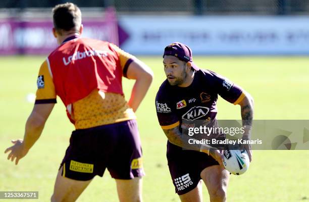 Issac Luke looks to pass during a Brisbane Broncos NRL training session at the Clive Berghofer Centre on June 30, 2020 in Brisbane, Australia.