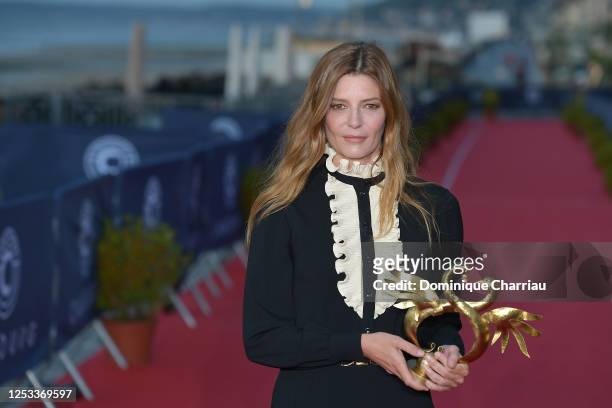 Chiara Mastroianni poses with her Award for Best Actress during the Closing Ceremony of the 34th Cabourg Film Festival on June 29, 2020 in Cabourg,...