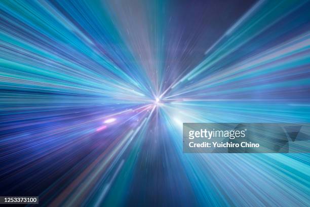 beyond the speed - exploding light in outer space stock-fotos und bilder