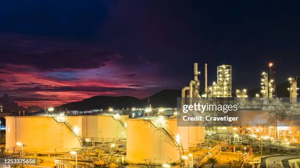 aerial view of land scape of oil refinery plant at twilight time. - qatar business stock pictures, royalty-free photos & images